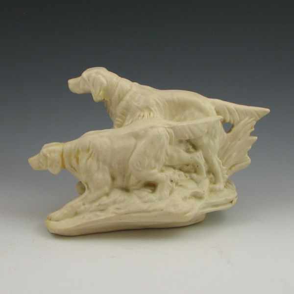 Appraisal: Very uncommon Weller Muskota hunting dogs in ivory glaze Unmarked