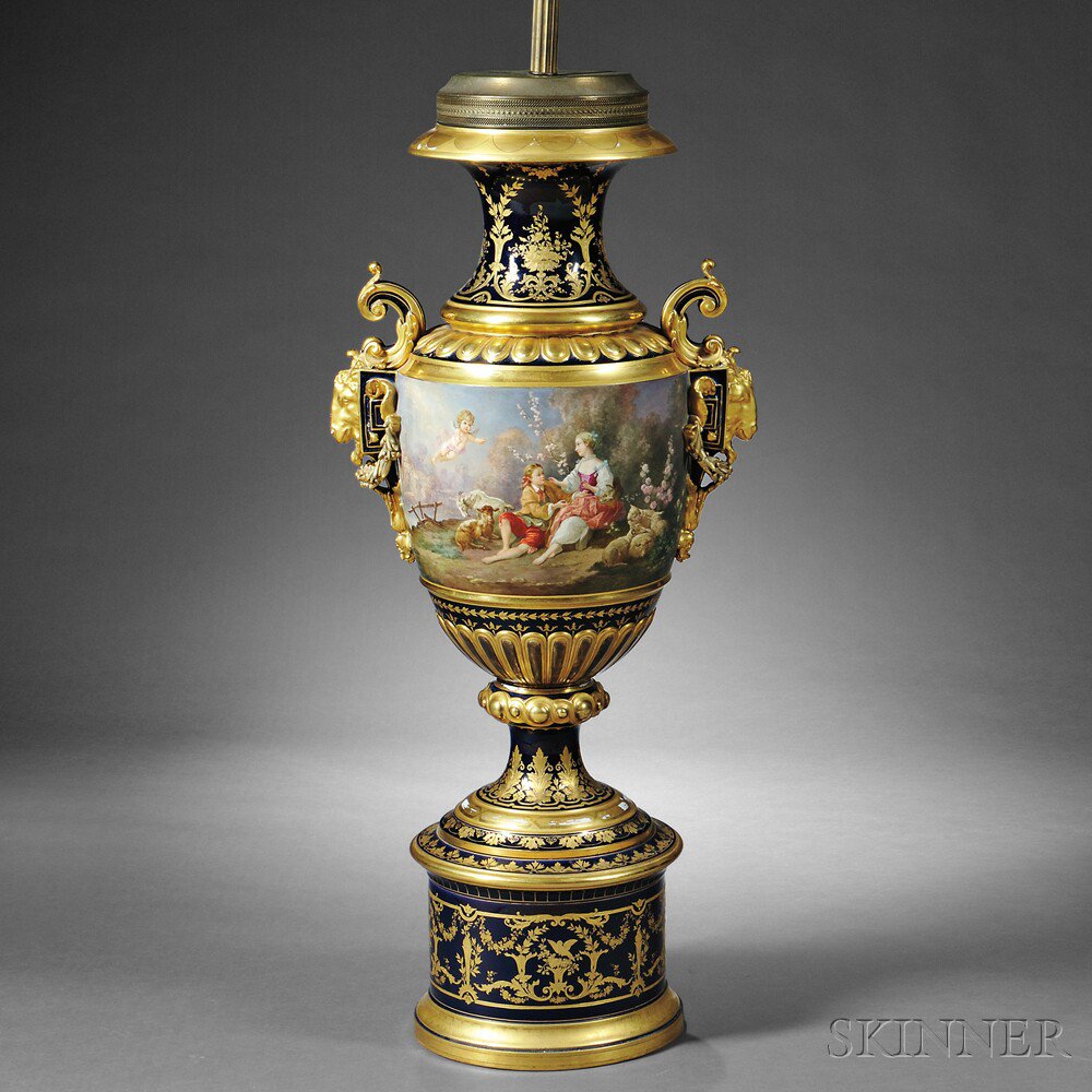 Appraisal: Sevres-style Porcelain Floor Vase Continental th century heavily gilded with