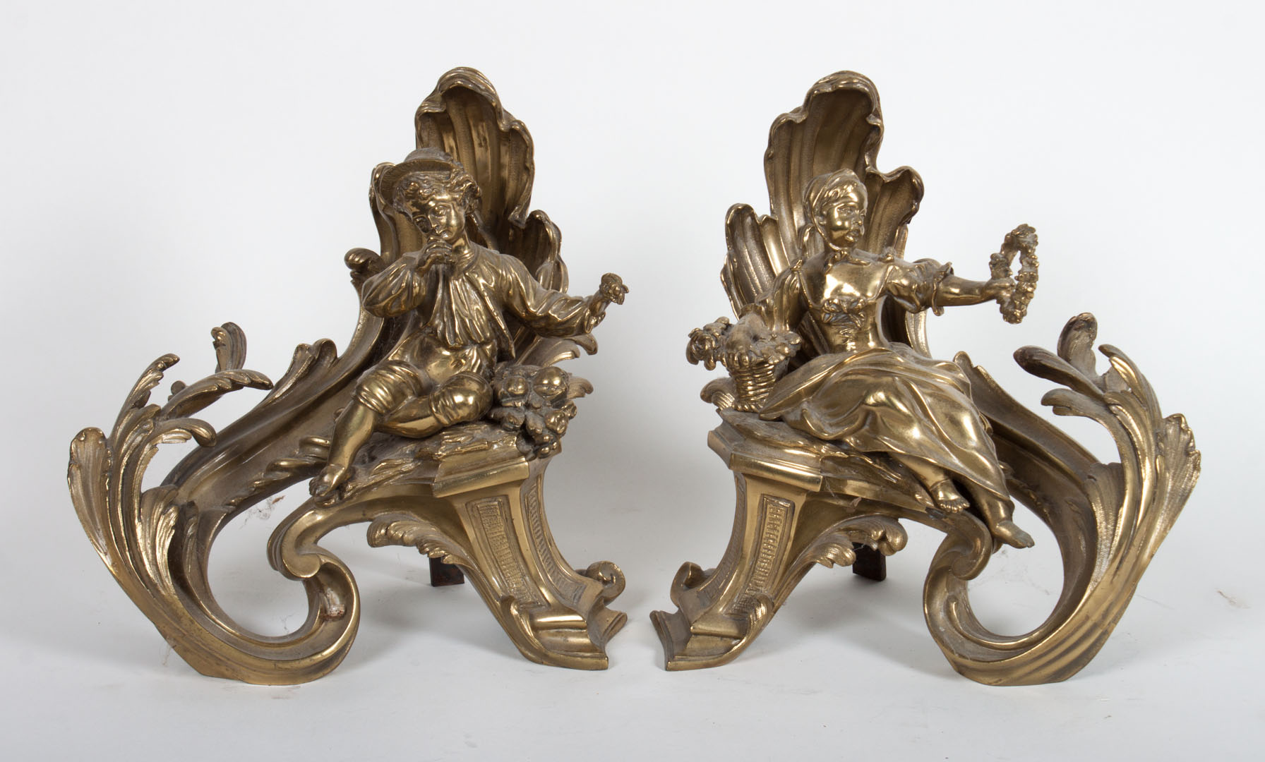 Appraisal: Pair of Louis XV style cast brass chenets foliated shell