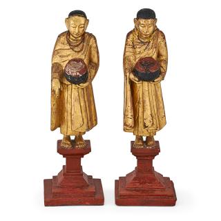 Appraisal: PAIR OF CHINESE GILTWOOD ATTENDANTS Each standing on red painted