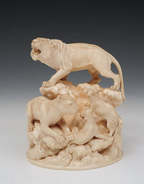 Appraisal: A JAPANESE IVORY GROUP of a pride of lions represented