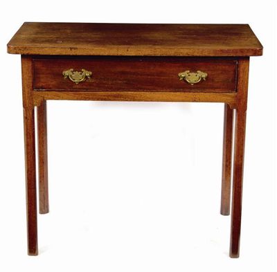 Appraisal: A mahogany side table with a frieze drawer on chamfered