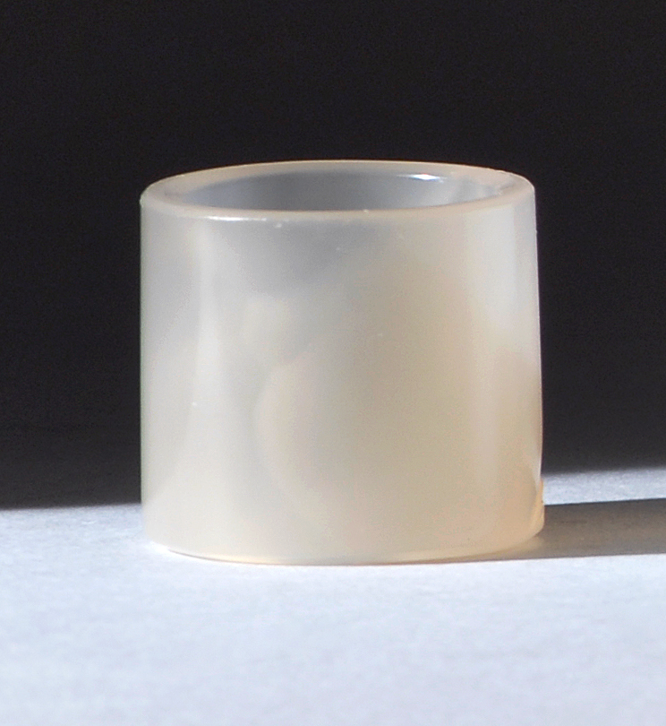 Appraisal: CHALCEDONY AGATE SCHOLAR'S RING Late th CenturyIn cylinder form with