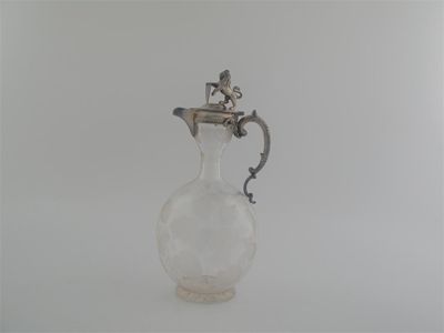 Appraisal: A Victorian plated mounted glass claret jug with a baluster