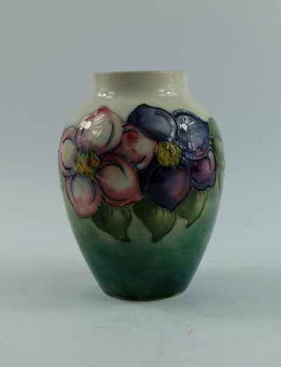 Appraisal: Moorcroft vase decorated in the clematis design on light green