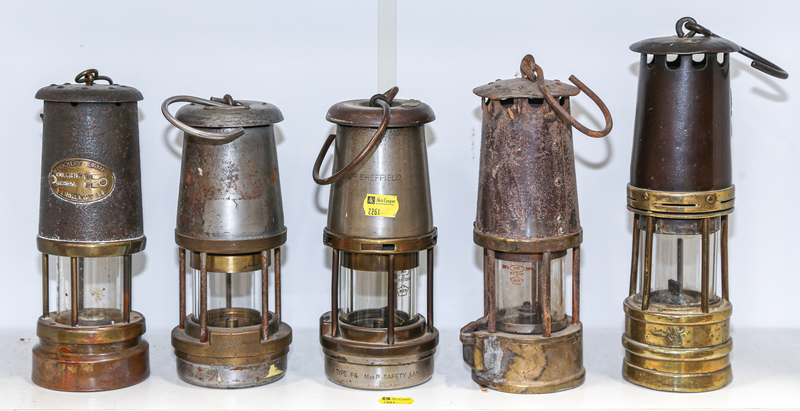 Appraisal: FIVE ASSORTED MINERS' LAMPS Late th and early th century