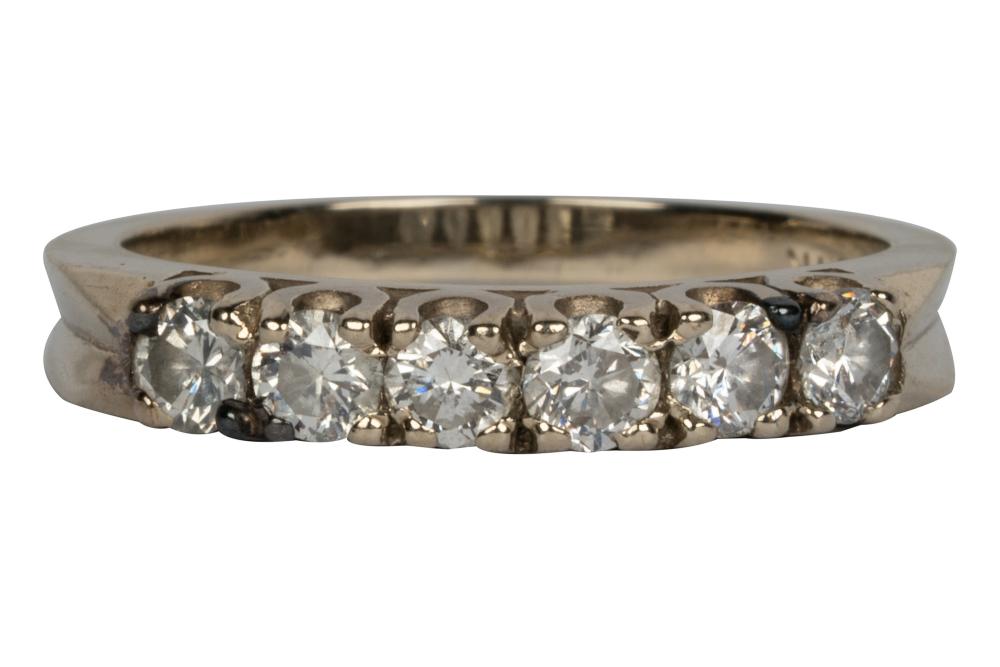 Appraisal: KARAT WHITE GOLD DIAMOND BAND RINGcontaining six full cut diamonds