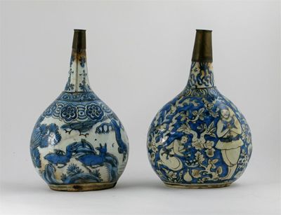 Appraisal: Two Safavid blue and white bottle vases one moulded and