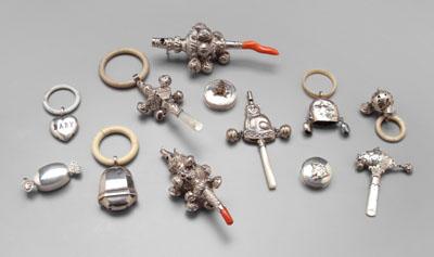 Appraisal: Silver baby rattles and boxes nine rattles several with whistles