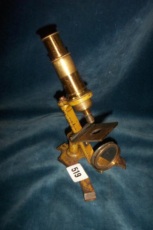 Appraisal: A Victorian brass microscope on a cast iron stand -