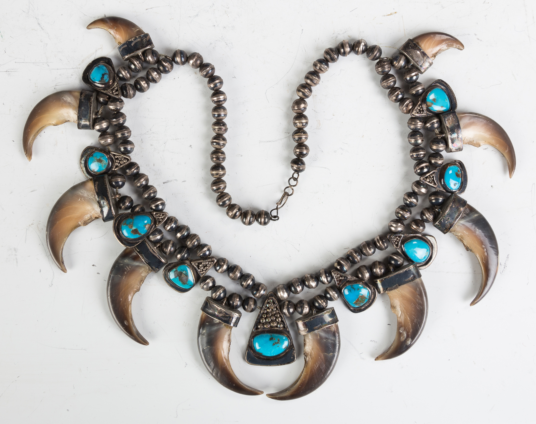 Appraisal: Vintage Navajo Silver and Turquoise Necklace with Bear Claws