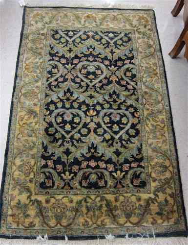 Appraisal: HAND KNOTTED ORIENTAL AREA RUG Indo-Persian having an overall floral