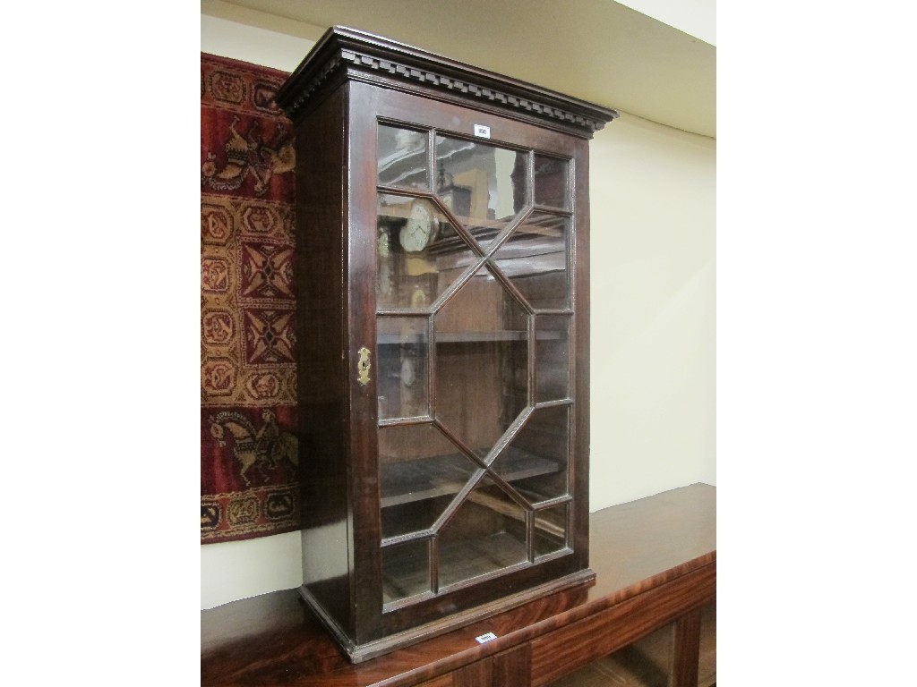 Appraisal: Mahogany glazed single door bookcase Provenance The Property of a