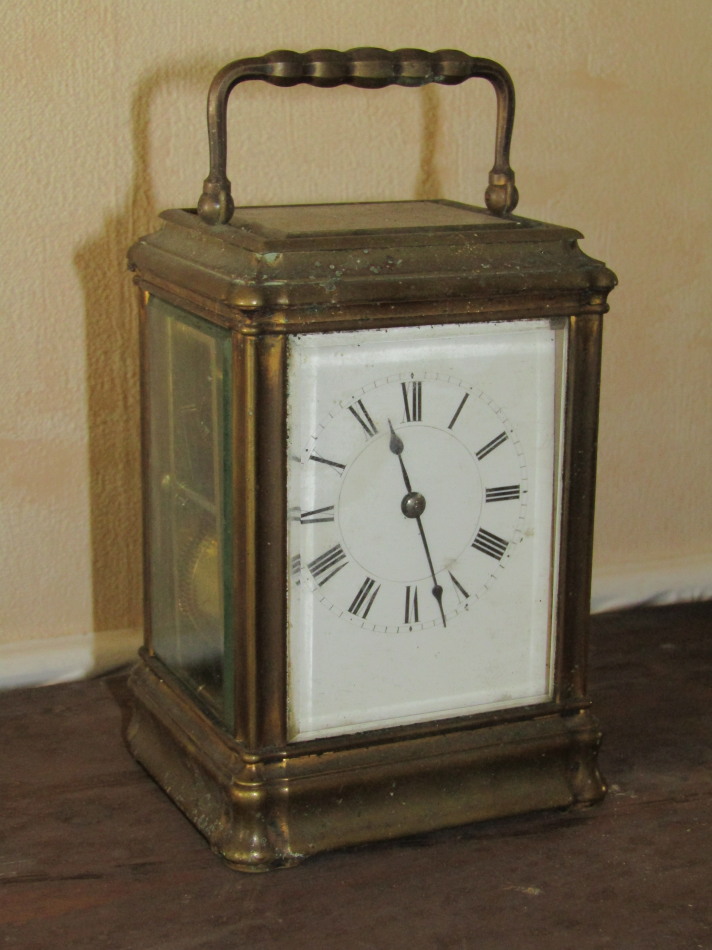 Appraisal: An early thC gilt brass carriage clock with timepiece movement