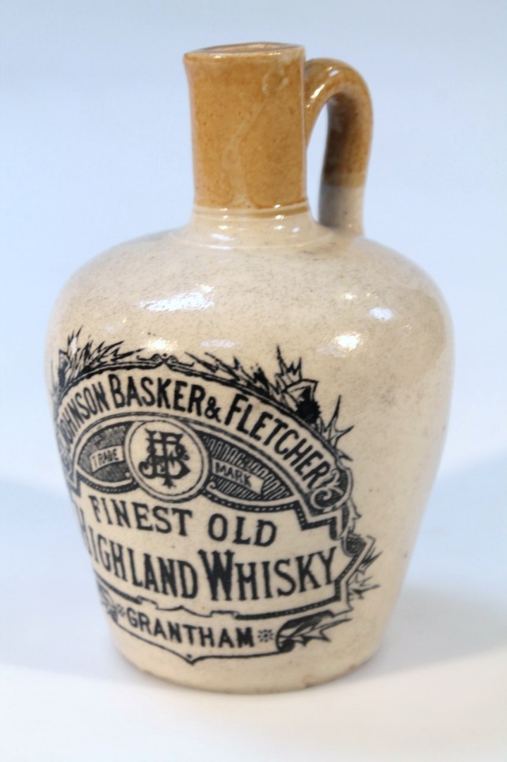 Appraisal: A Johnson Basker Fletcher Grantham Finest Old Highland whisky stoneware