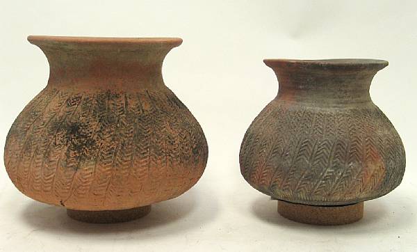 Appraisal: Two Thai pottery storage jars Each impressed with a herringbone