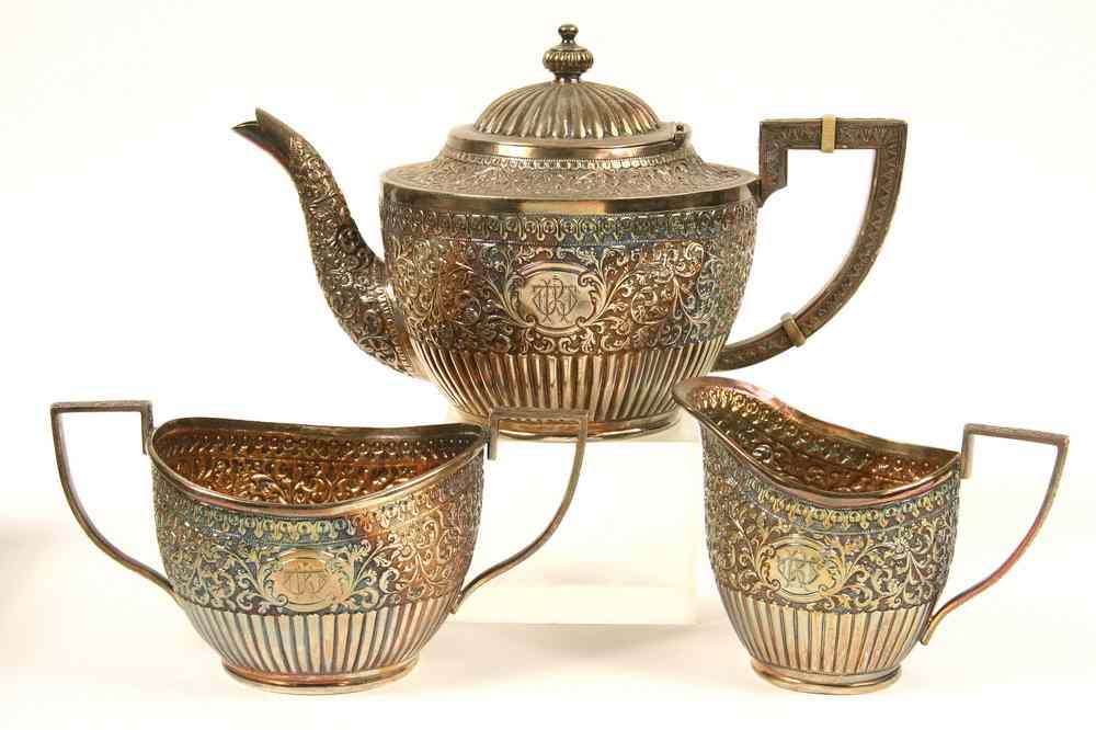 Appraisal: PC ANGLO-INDIAN SILVER PRESENTATION TEA SERVICE - Three-Piece Embossed Anglo-Indian