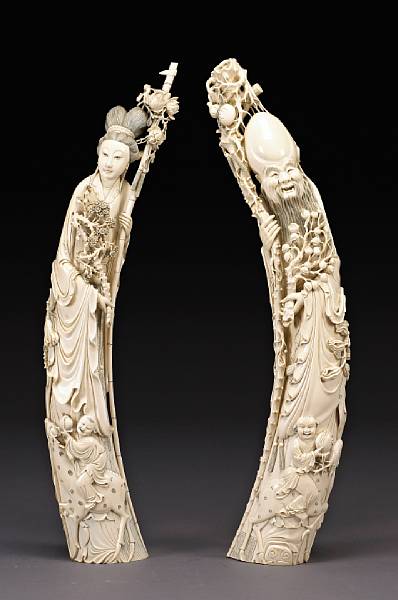 Appraisal: A pair of massive carved ivory figural tusks th Century