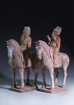 Appraisal: A pair of Chinese pottery models of equestrian musicians each