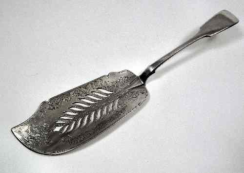 Appraisal: A Victorian Irish silver fiddle pattern fish slice the shaped