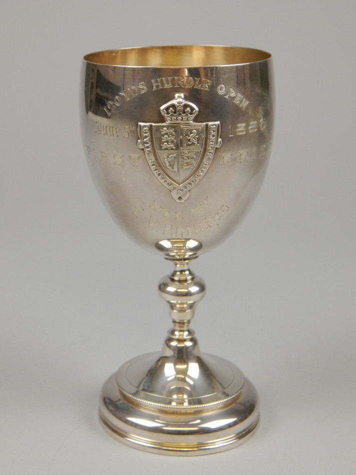 Appraisal: A Victorian silver trophy cup engraved to the centre The