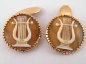 Appraisal: A pair of yellow metal shell cameo cufflinks marked k