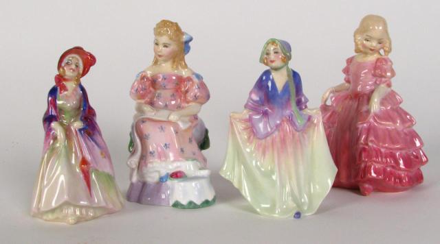 Appraisal: Group of four Royal Doulton porcelain figures all approximately inches