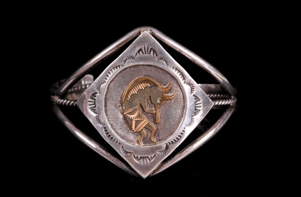 Appraisal: Navajo Gold Overlay Kokopelli Sterling Bracelet For your consideration is