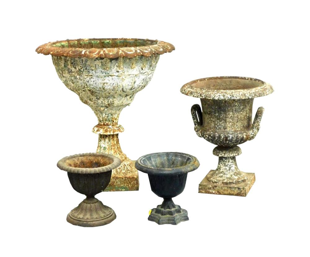 Appraisal: Four Neo-Classical style cast iron urn planters two larger accompanied