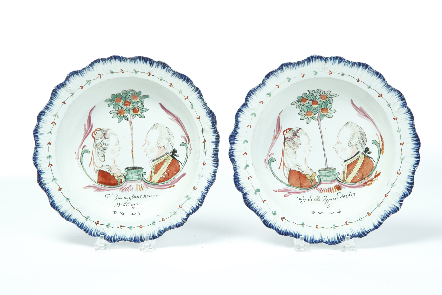 Appraisal: PAIR OF ENGLISH SOFTPASTE SOUP PLATES Early th century Blue