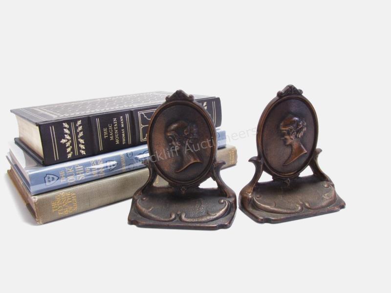 Appraisal: Bronze Bookends and Books pair of bronze bookends depicting bust