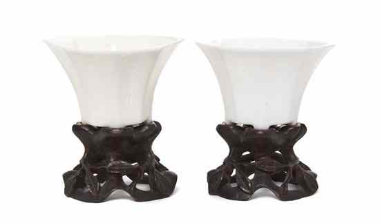 Appraisal: A Pair of Chinese White Porcelain Wine Cups having faceted