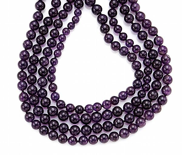 Appraisal: An amethyst bead and fourteen karat gold necklace estimated total