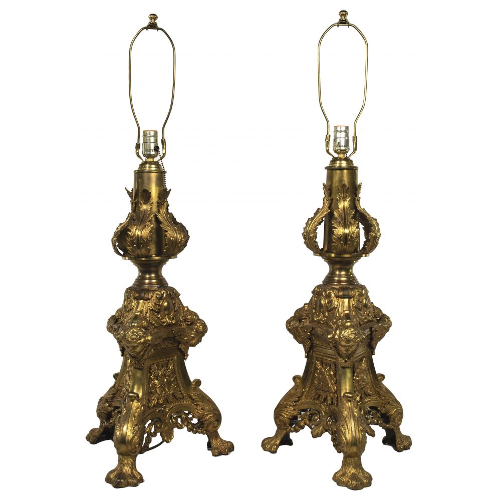 Appraisal: BAROQUE STYLE BRASS LAMPSMatching pair with each having panels of