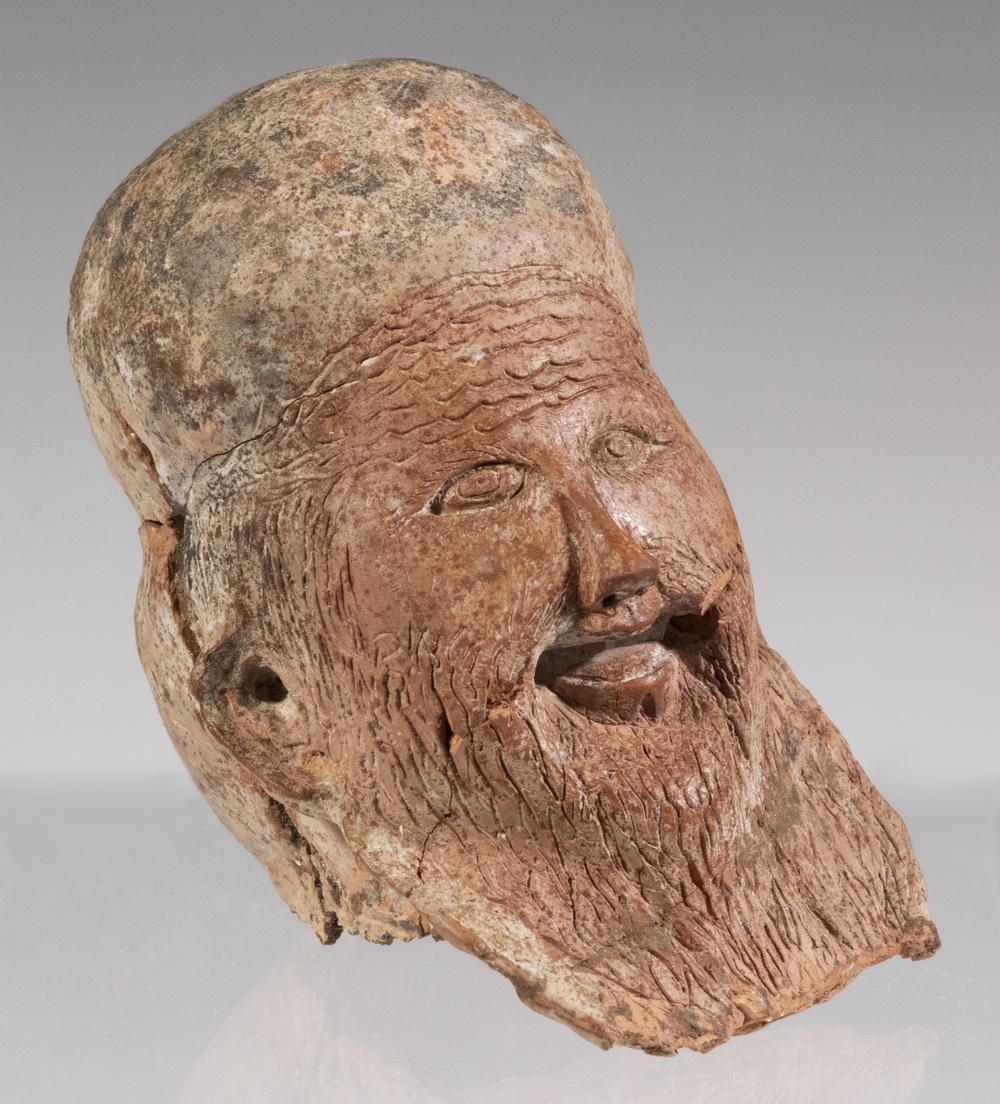 Appraisal: CHINESE SONG DYNASTY EXPRESSIVE LAUGHING HEAD OF AN ELDERLY MAN