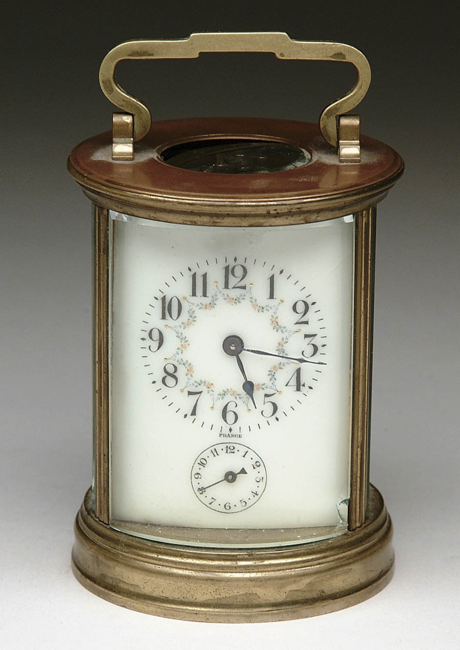 Appraisal: CARRIAGE CLOCK French carriage clock in an unusual round shape