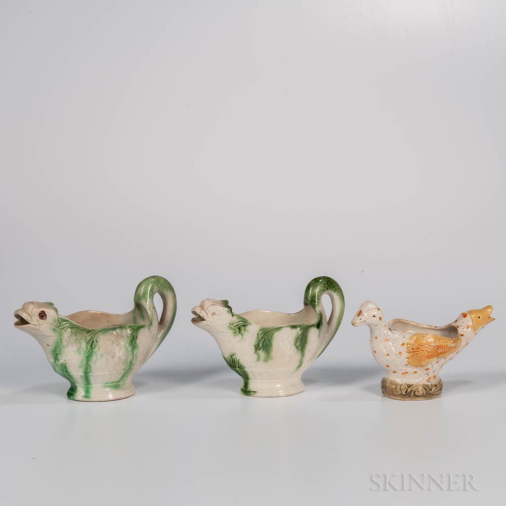 Appraisal: Three Staffordshire Earthenware Figural Sauceboats Three Staffordshire Earthenware Figural Sauceboats