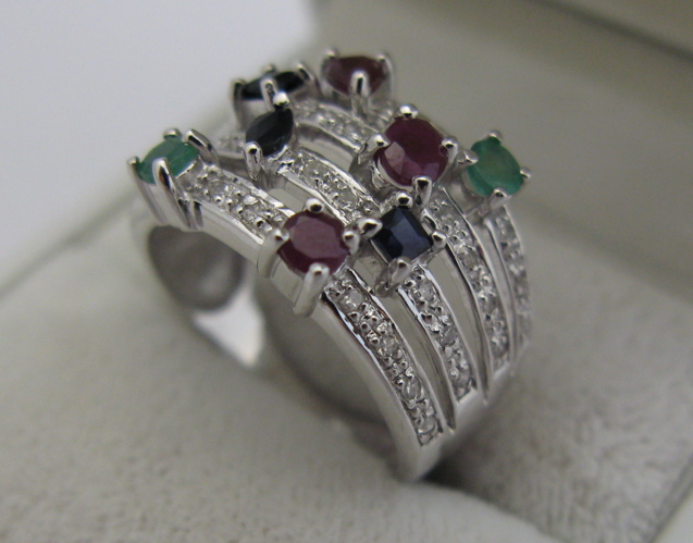 Appraisal: RUBY SAPPHIRE AND EMERALD RING The k white gold setting