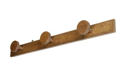 Appraisal: A Victorian oak coat rack with three turned hooks in