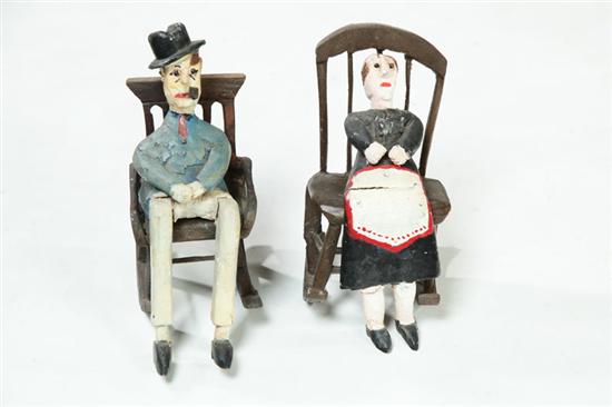 Appraisal: PAIR OF FOLK ART FIGURES Second half- th century labeled