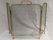 Appraisal: A three fold brass mesh fireguard x cm high