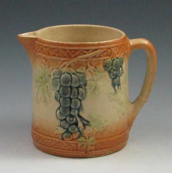 Appraisal: Brush-McCoy Majolica Grape Pitcher unmarked several chips on the rim