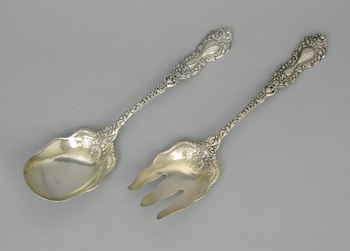 Appraisal: A Pair of Sterling Silver Servers in Chrysanthemum Pattern by