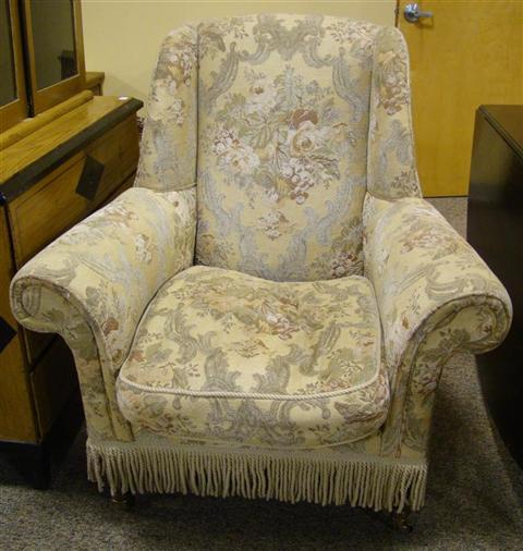 Appraisal: LILLIAN AUGUST UPHOLSTERED ARMCHAIR h w d in