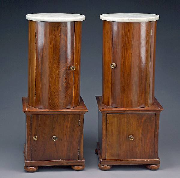 Appraisal: A pair of North Italian Neoclassical palisander columnar cabinets on