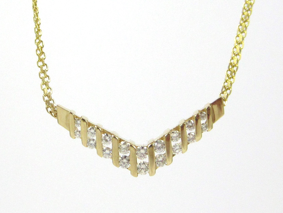 Appraisal: DIAMOND AND FOURTEEN KARAT GOLD NECKLACE measuring - inches in