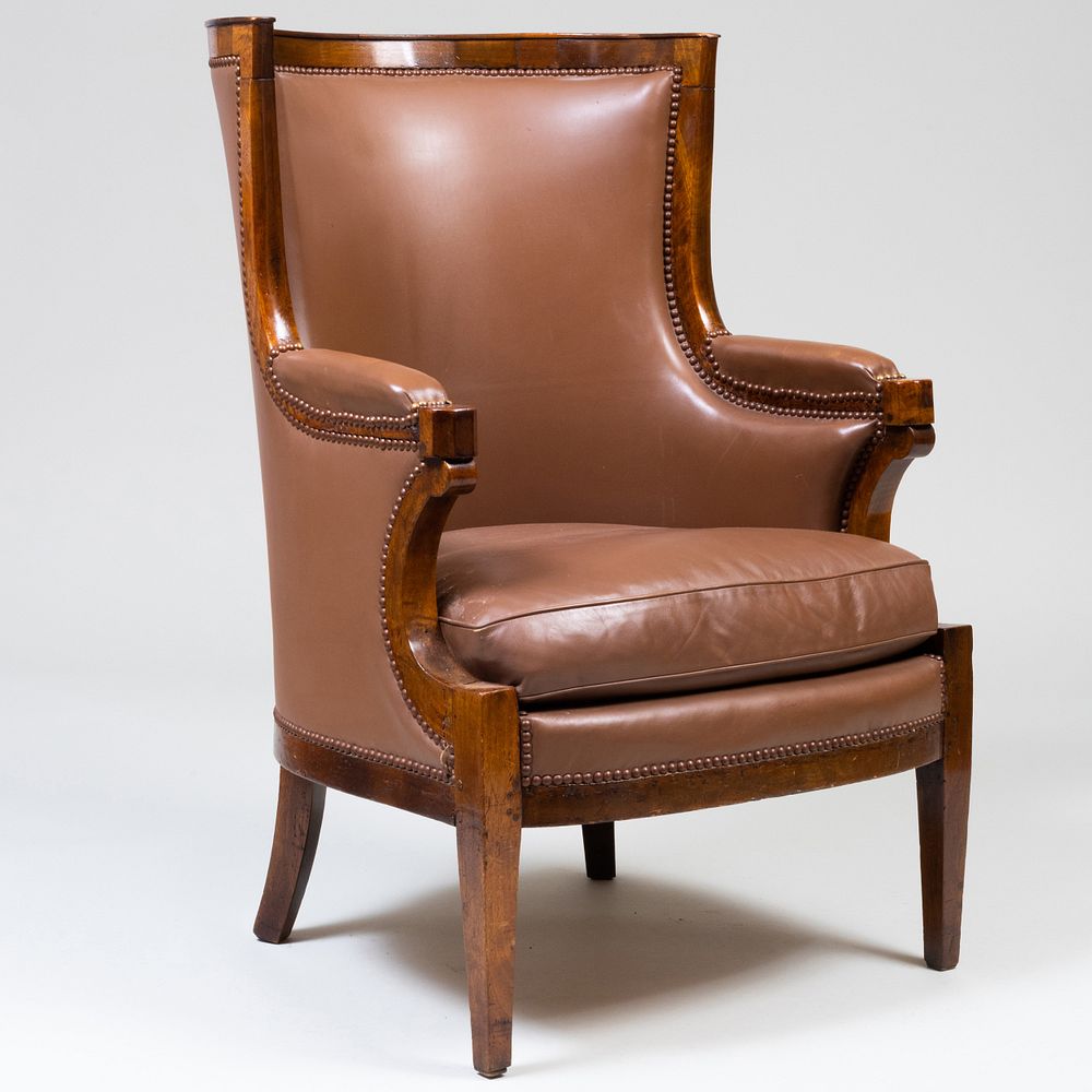 Appraisal: French Provincial Walnut and Leather Upholstered Armchair x x in