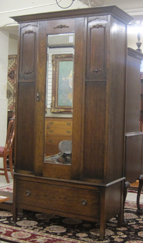 Appraisal: SINGLE DOOR OAK WARDROBE English early th century the door