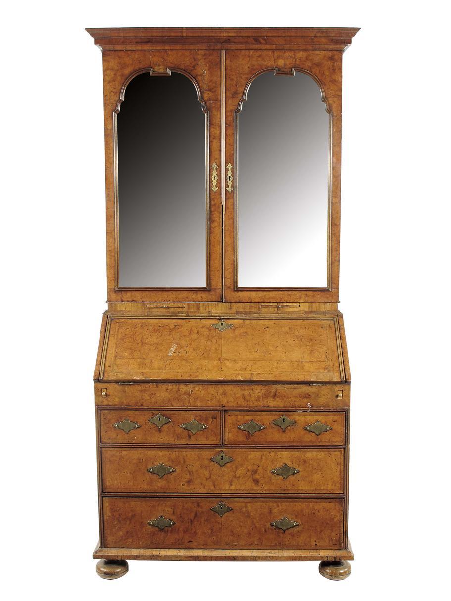 Appraisal: A George I burr elm bureau cabinet