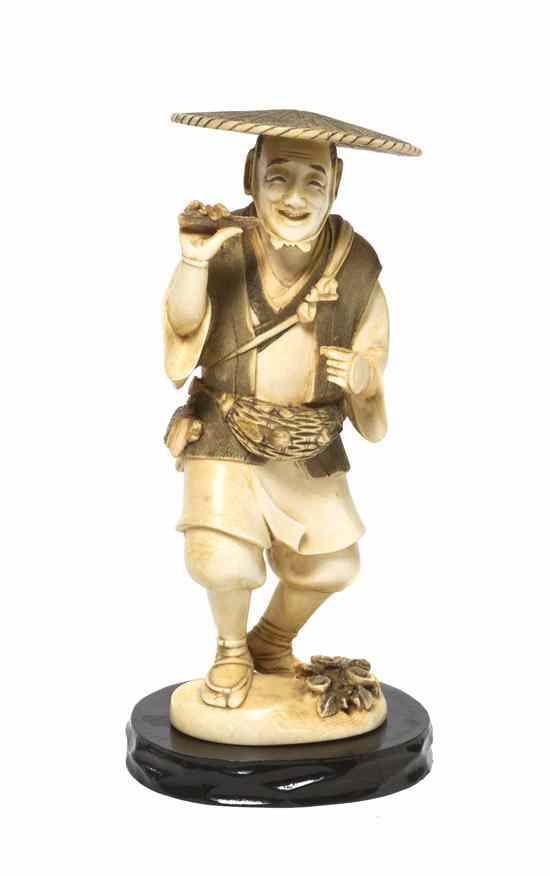 Appraisal: A Japanese Carved Ivory Okimono of a Man depicting a